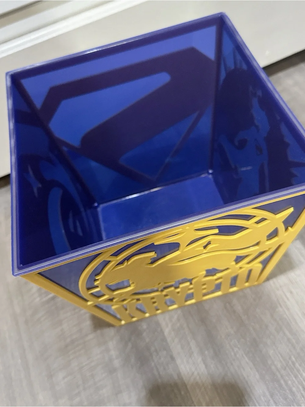 Yellow and Blue Supergirl Decorative Wall Panel - Heroic Silhouette Accent